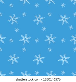 white color snowflakes on blue background vector