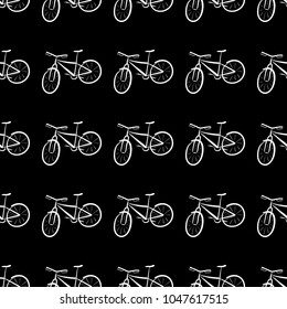 White colored bicycles pattern on black background