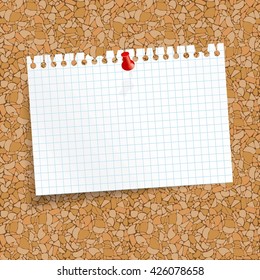 white colored checkered scrap of paper with pin needle