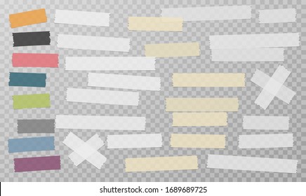 White and colorful different size adhesive, sticky, masking tape, paper pieces are on grey squared background