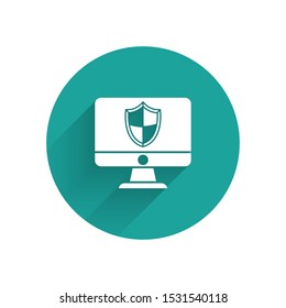 White Computer monitor and shield icon isolated with long shadow. Security, firewall technology, internet privacy safety or antivirus. Green circle button. Vector Illustration