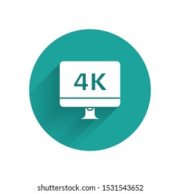 White Computer PC monitor display with 4k video technology icon isolated with long shadow. Green circle button. Vector Illustration
