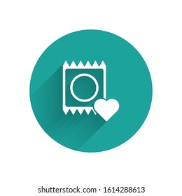 White Condom in package icon isolated with long shadow. Safe love symbol. Contraceptive method for male. Green circle button. Vector Illustration