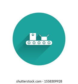 White Conveyor belt with cardboard box icon isolated with long shadow. Green circle button. Vector Illustration