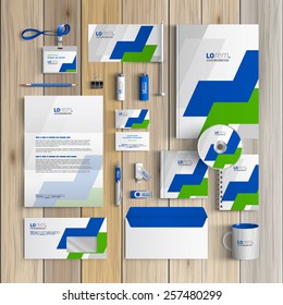 White corporate identity template design with green and blue geometric elements. Business stationery