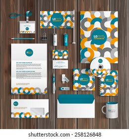 White corporate identity template design with orange and blue round pattern. Business stationery