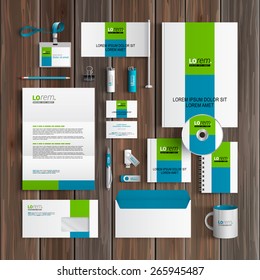 White corporate identity template design with blue and green square shapes. Business stationery