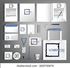 White corporate identity template with geometric black object. A set of business office supplies.
