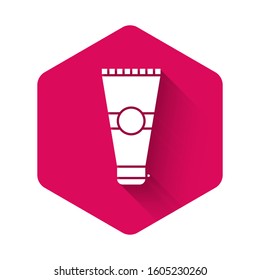 White Cream or lotion cosmetic tube icon isolated with long shadow. Body care products for men. Pink hexagon button. Vector Illustration