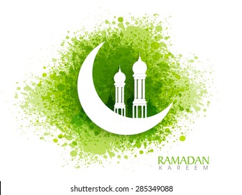 White creative mosque on glossy crescent moon on green color splash background for Islamic holy month of prayers, Ramadan Kareem celebration.