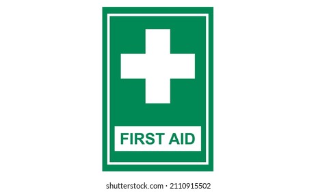 White cross first aid sign on green background.