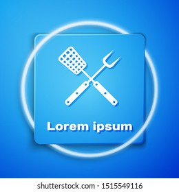 White Crossed fork and spatula icon isolated on blue background. BBQ fork and spatula sign. Barbecue and grill tools. Blue square button. Vector Illustration