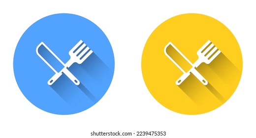 White Crossed knife and fork icon isolated with long shadow background. Cutlery symbol. Circle button. Vector