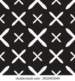White crosses pattern and black background.