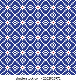 White cross-stitch and red dot knitting pattern on blue background. White square dots on blue backdrop. Monochrome fabric pattern design for sale. Knitting handicraft art.