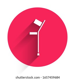 White Crutch or crutches icon isolated with long shadow. Equipment for rehabilitation of people with diseases of musculoskeletal system. Red circle button. Vector Illustration