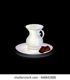 white cup and chocolate