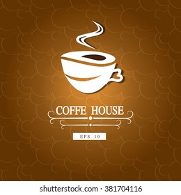 White cup of coffee on a brown background.