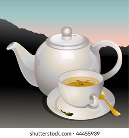 white cup expecting a teapot on a background mountains and sky