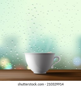 white cup on the background of a window