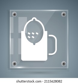 White Cup of tea with lemon icon isolated on grey background. Square glass panels. Vector