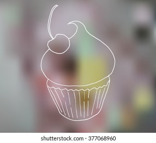 white cupcake circuit on blurred background