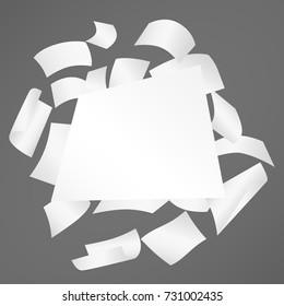 White curl paper notebook sheets for note or message falling on dark gray background.