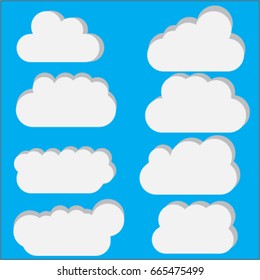  White curly clouds on blue summer sky