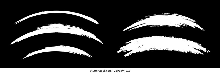 White curved brush lines. Half round smears. Set of hand drawn curve grunge brush lines. Vector illustration