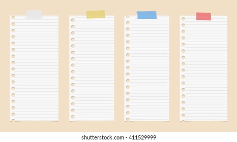 White cut out lined notebook paper are stuck with colorful adhesive tape on brown background