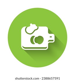 White Cutting board with vegetables icon isolated with long shadow background. Chopping Board symbol. Green circle button. Vector