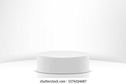 white cylinder in the white studio room