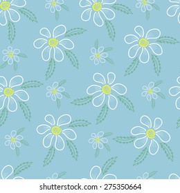 White daisies with green leaves on a blue background