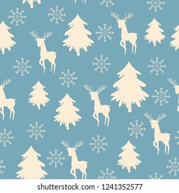 White deer, snowflake and Christmas tree silhouettes on blue background. Vector seamless pattern