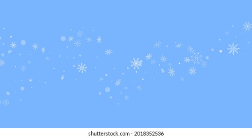 White delicate openwork snowflakes are scattered on a blue background. Festive background, postcard design, wallpaper