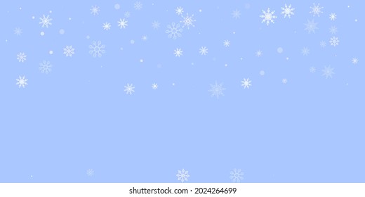 White delicate openwork snowflakes are scattered on a blue background. Festive background, postcard design, wallpaper