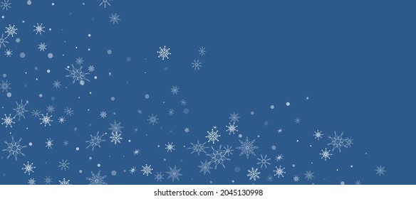 White delicate openwork snowflakes are scattered on a blue background. Festive background, postcard design, wallpaper