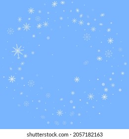 White delicate openwork snowflakes are scattered on a blue background. Festive background, postcard design, wallpaper