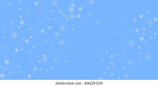 White delicate openwork snowflakes are scattered on a blue background. Festive background, postcard design, wallpaper