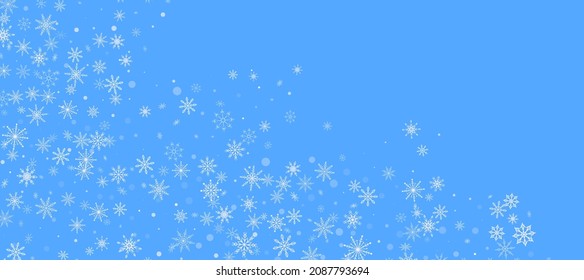 White delicate openwork snowflakes are scattered on a blue background. Festive background, postcard design, wallpaper