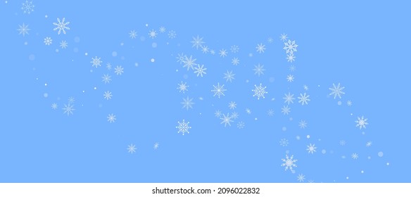 White delicate openwork snowflakes are scattered on a blue background. Festive background, postcard design, wallpaper
