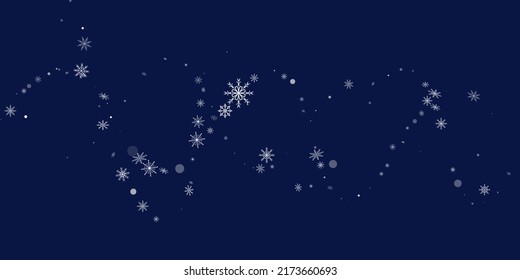 White delicate openwork snowflakes are scattered on a blue background. Festive background, postcard design, wallpaper