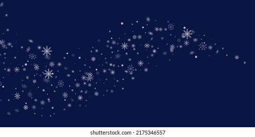 White delicate openwork snowflakes are scattered on a blue background. Festive background, postcard design, wallpaper