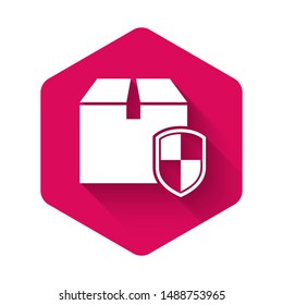 White Delivery pack security symbol with shield icon isolated with long shadow. Delivery insurance. Insured cardboard boxes beyond the shield. Pink hexagon button. Vector Illustration