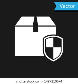 White Delivery pack security symbol with shield icon isolated on black background. Delivery insurance. Insured cardboard boxes beyond the shield.  Vector Illustration