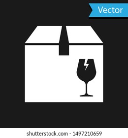 White Delivery package box with fragile content symbol of broken glass icon isolated on black background. Box, package, parcel sign.  Vector Illustration