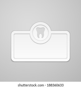 White dental plate on gray background