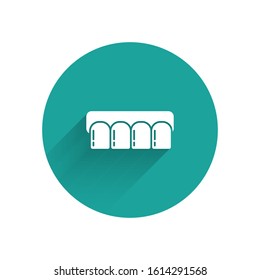 White Dentures model icon isolated with long shadow. Teeth of the upper jaw. Dental concept. Green circle button. Vector Illustration