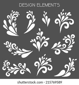 White design elements. Vector floral decoration made from swirl shapes.