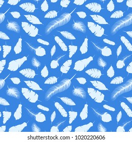 A lot of white different elegant feather silhouettes on blue seamless pattern